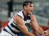 MELBOURNE, AUSTRALIA - APRIL 01: Tom Hawkins of the Cats handpasses the ball during the 2024 AFL Round 03 match between the Hawthorn Hawks and the Geelong Cats at the Melbourne Cricket Ground on April 01, 2024 in Melbourne, Australia. (Photo by Dylan Burns/AFL Photos via Getty Images)