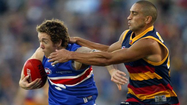 Bob Murphy recalls Andrew McLeod grinning at him during a match.