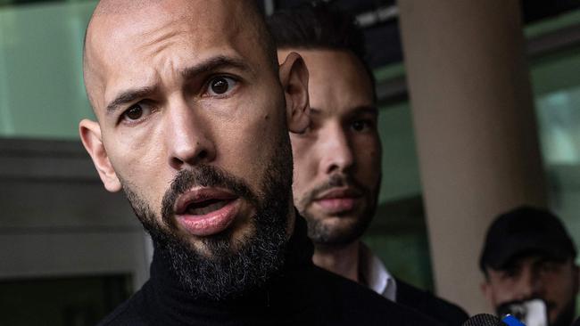 Andrew Tate. That’s his brother Tristan half-visible behind him. Picture: Alon Skuy/Getty Images via AFP