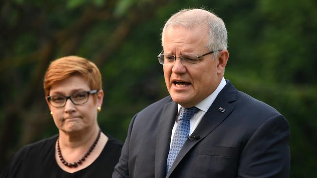 Australian Prime Minister Scott Morrison (right) and Foreign Minister Marise Payne address the media at Kirribilli House in Sydney, Wednesday, December 10, 2019. Up to three Australians have been killed after a volcano erupted in New Zealand, with 11 people still missing and 13 in hospital. (AAP Image/Joel Carrett) NO ARCHIVING