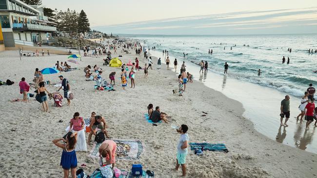 Beach goers enjoying Henley Beach. Picture: Matt Loxton.