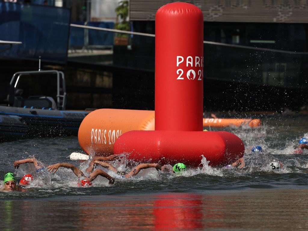 Athletes in the, um, thick of it at the men's individual triathlon on July 31. Picture: Anne-Christine Poujoulat/AFP