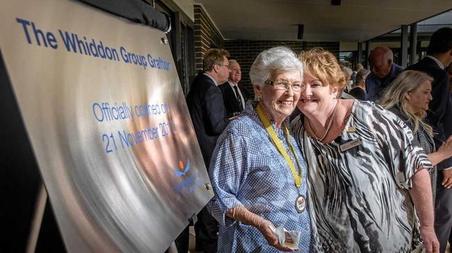 DOUBLE CELEBRATION: Elaine Stephenson gets a cuddle from Director of Care Services Grafton Sandra Osborne at the opening of the new wing of Whiddon Group. Elaine, whose husband is at Whiddon Grafton, was given a surprise 80th birthday cake. Picture: Adam Hourigan Photography