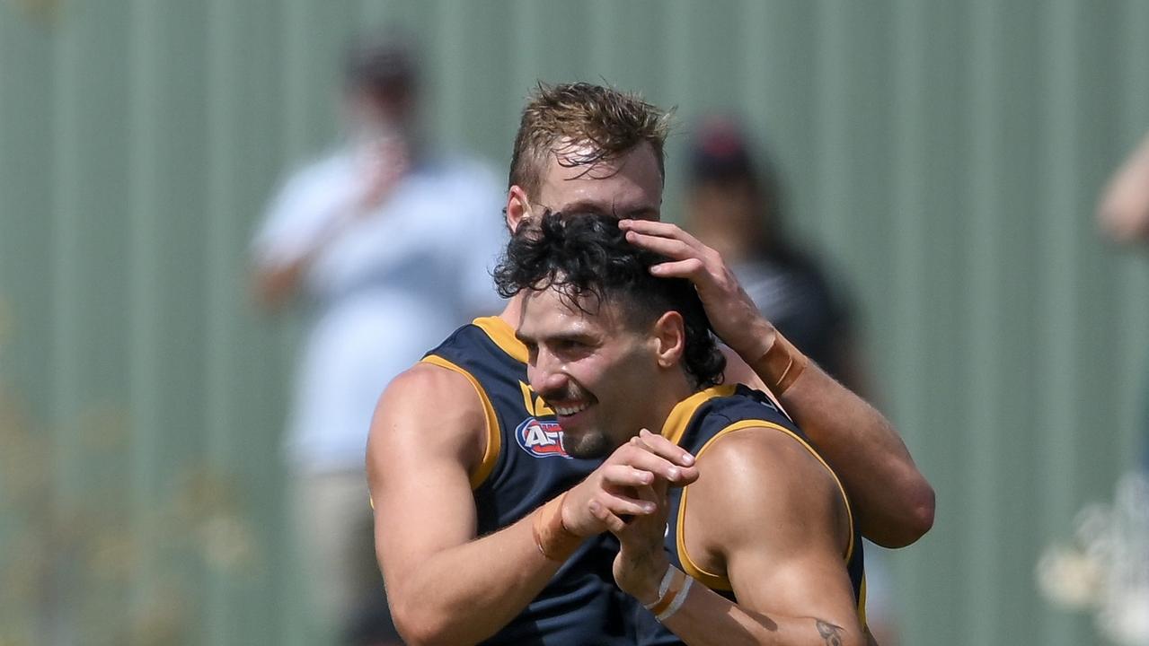 ADELAIDE, AUSTRALIA - MARCH 02: Jordan Dawson of the Crows celebrates a goal with Izak Rankine of the Crows during the 2024 AFL Community Series match between Adelaide Crows and West Coast Eagles at Hisense Stadium on March 02, 2024 in Adelaide, Australia. (Photo by Mark Brake/Getty Images)