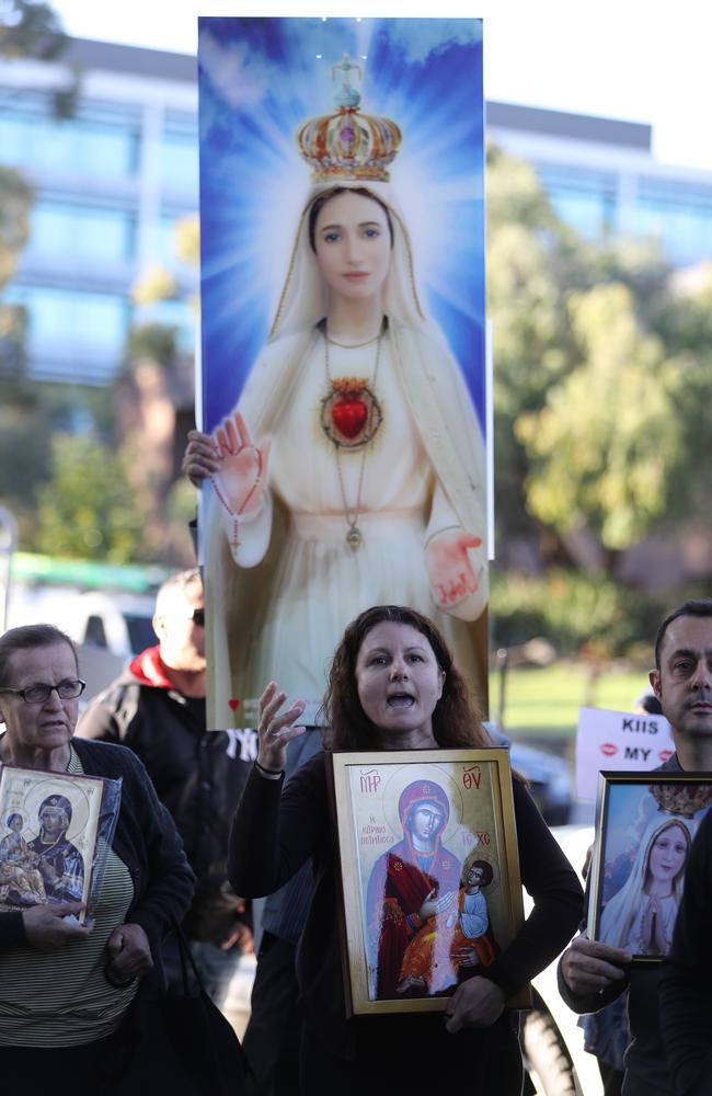 Protesters outside the KIIS FM studio at North Ryde. Protesters are holding a peaceful stand outside the studios while Kyle and Jackie o are on holidays. picture John Grainger