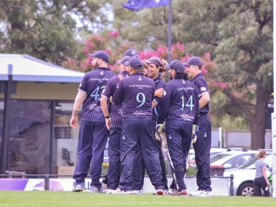 The Clays bunch after a wicket.