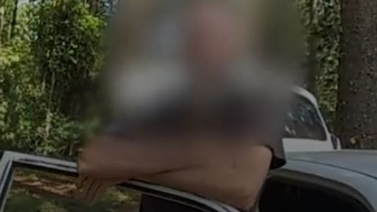 Police have released footage of their arrest of a man at Yarraman for alleged threats against a Jewish organisation.