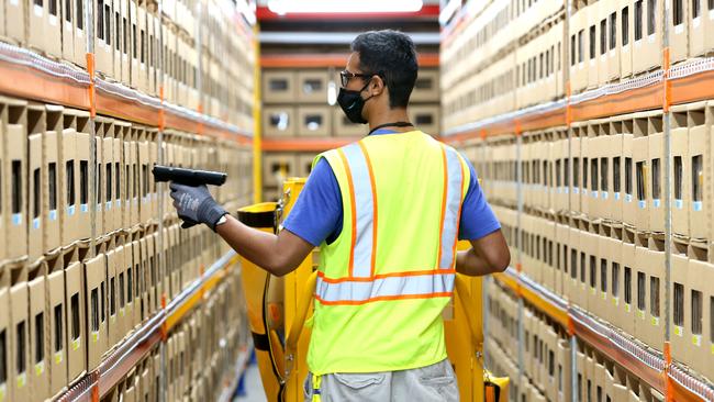 Amazon learning ambassador Khushal Banymandhub at the Amazon distribution warehouse in Lytton, Brisbane. Picture: Steve Pohlner