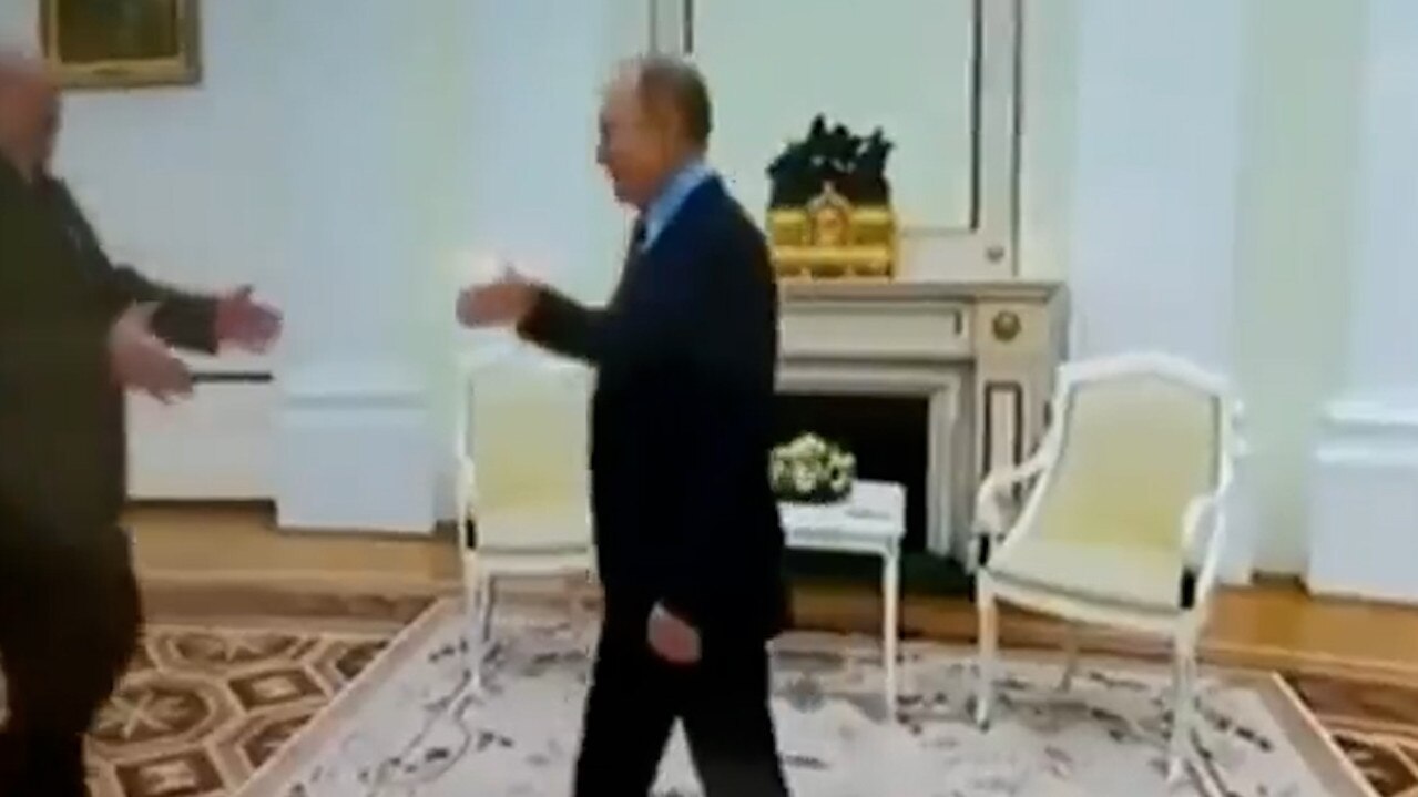 This video of Vladimir Putin shows his hand shaking ‘uncontrollably’.