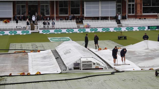 The groundskeepers at Lord’s were the hardest working people at the ground on Day One of the Test. Picture: Adrian Dennis/AFP