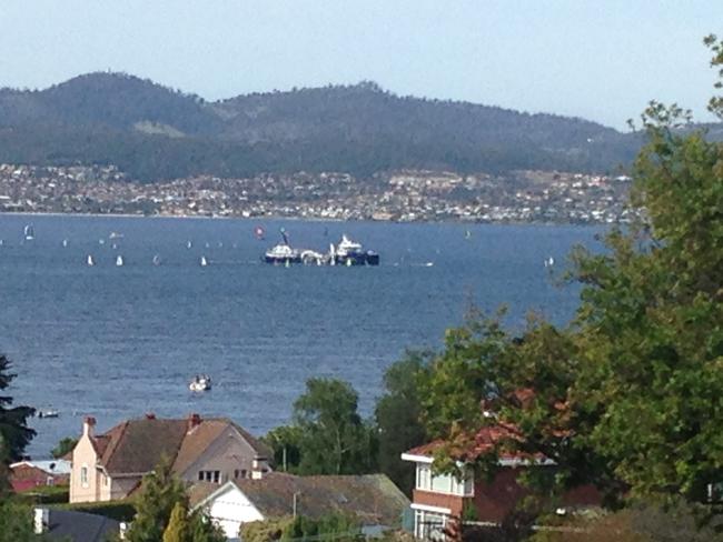 The Ronja Huon surrounded by small craft on the River Derwent on Saturday. Picture: SUPPLIED