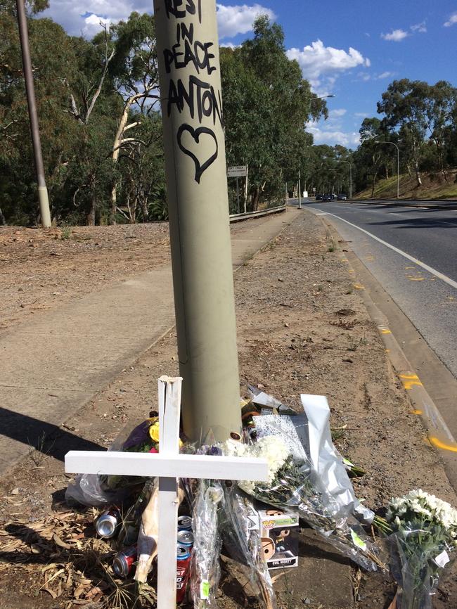 Tributes for the man at the crash site on Golden Grove Rd at Ridgehaven. Picture: Doug Robertson