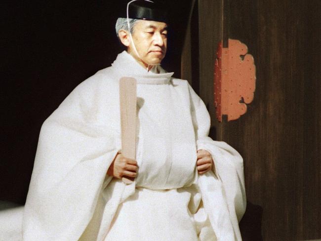 This file picture taken on November 12, 1990 shows Japanese Emperor Akihito walking to a Shinto sanctuary inside the Imperial Palace in Tokyo. Picture: AFP.