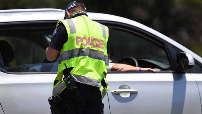 Police at the Queensland-New South Wales border checkpoint in October. Picture: NCA NewsWire / Dan Peled