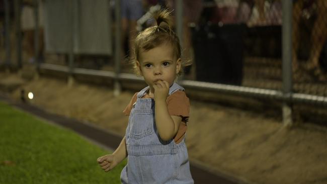 Daisy enjoys the quarter time break playing on the field with here dad during the opening game of the NTFL 22/23 season. Picture: (A)manda Parkinson