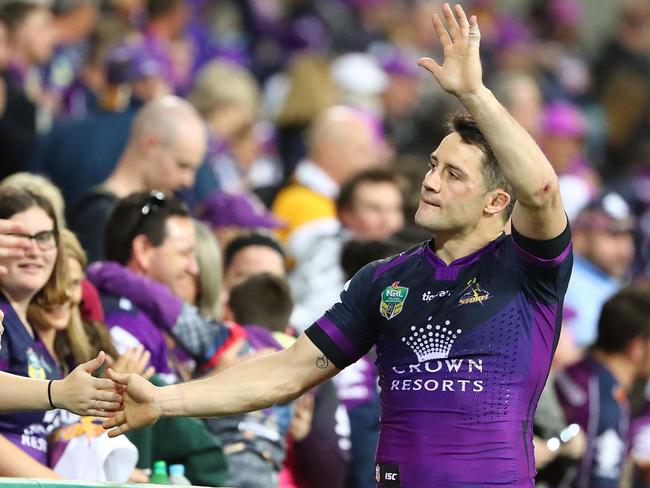 MELBOURNE, AUSTRALIA - SEPTEMBER 22:  Cooper Cronk of the Storm waves goodbye to fans in the AAMI Park crowd for the final time after the NRL Preliminary Final match between the Melbourne Storm and the Brisbane Broncos at AAMI Park on September 22, 2017 in Melbourne, Australia.  (Photo by Scott Barbour/Getty Images)