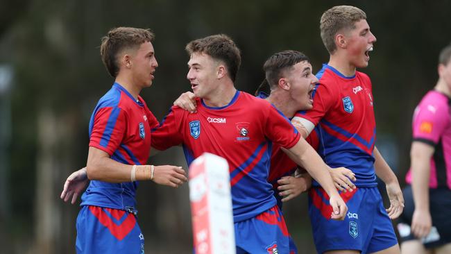 Newcastle celebrate a try in the Andrew Johns Cup Grand Final. Picture: Sue Graham