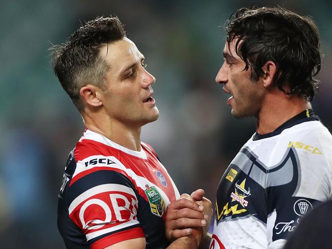 SYDNEY, AUSTRALIA - AUGUST 04:  Cooper Cronk of the Roosters and Johnathan Thurston of the Cowboys shake hands after the round 21 NRL match between the Sydney Roosters and the North Queensland Cowboys at Allianz Stadium on August 4, 2018 in Sydney, Australia.  (Photo by Mark Metcalfe/Getty Images)