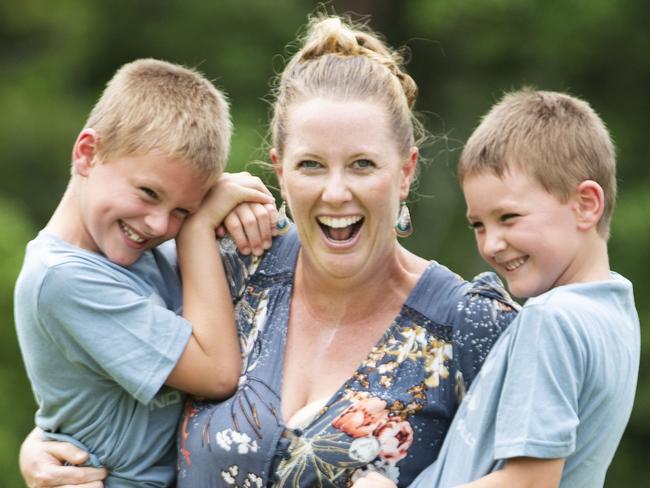 Sasha Job from Bundaberg who has lost 12kg following the CSIRO diet plays with her sons Nathan 7, and Alistair 6. Picture Lachie Millardx