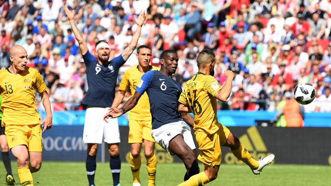 France’s Paul Pogba scoring against Australia in their opening World Cup game in 2018. (AAP Image/Dean Lewins)