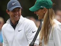 AUGUSTA, GA - APRIL 04:  Rory McIlroy of Northern Ireland laughs with his wife Erica during the Par 3 Contest prior to the start of the 2018 Masters Tournament at Augusta National Golf Club on April 4, 2018 in Augusta, Georgia.  (Photo by Patrick Smith/Getty Images)