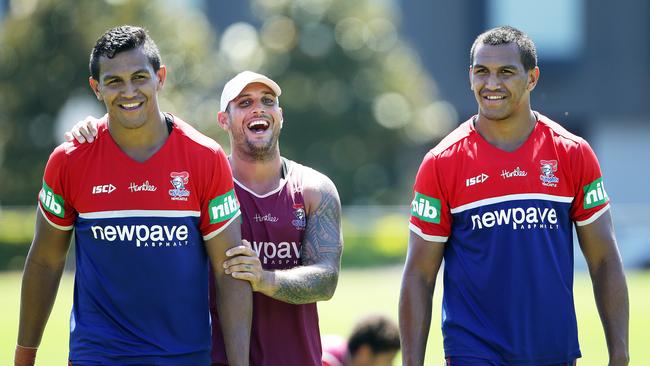 Veteran lock Jeremy Smith gives Daniel and Jacob Saifiti some encouragement at training before they make their first grade debut for the club against the Gold Coast this Sunday. Picture by Peter Lorimer