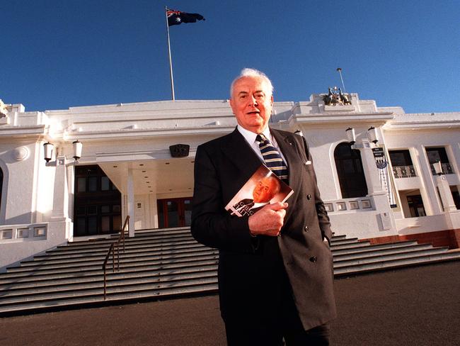 Former Australian Prime Minister Gough Whitlam standing on the steps of Old Parliament House, Canberra after the launch of his book 