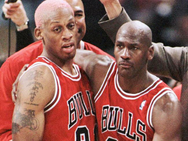 Chicago Bulls' Dennis Rodman, (L), and Michael Jordan leave the court after beating the Milwaukee Bucks 86-80 , Apr 16, 1996, in Milwaukee. The Bulls became the first NBA team to win 70 regular season games.  AP Photo/Jeffrey/Phelps  sport o/seas basketball headshot usa records