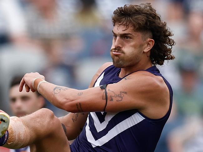 GEELONG, AUSTRALIA - MARCH 15: Luke Jackson of the Dockers kicks the ball during the 2025 AFL Round 01 match between the Geelong Cats and the Fremantle Dockers at GMHBA Stadium on March 15, 2025 in Geelong, Australia. (Photo by Michael Willson/AFL Photos via Getty Images)