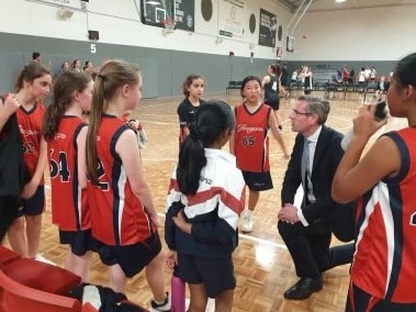 Dominic Perrottet gives the Under-13 Panthers some tip. Picture: Supplied