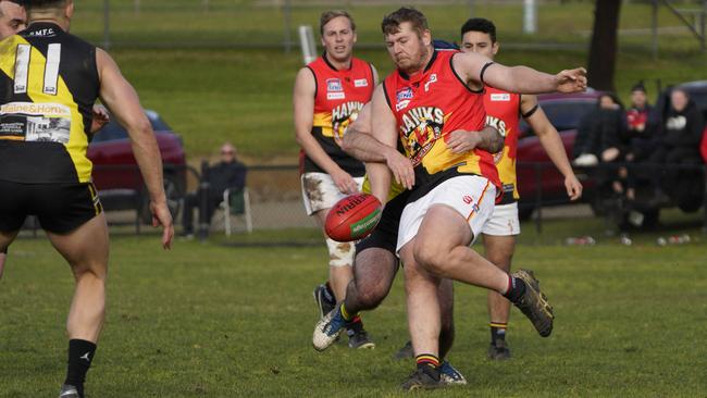 SFNL: Hallam’s Jonathan Daly gets a kick away under pressure. Picture: Valeriu Campan