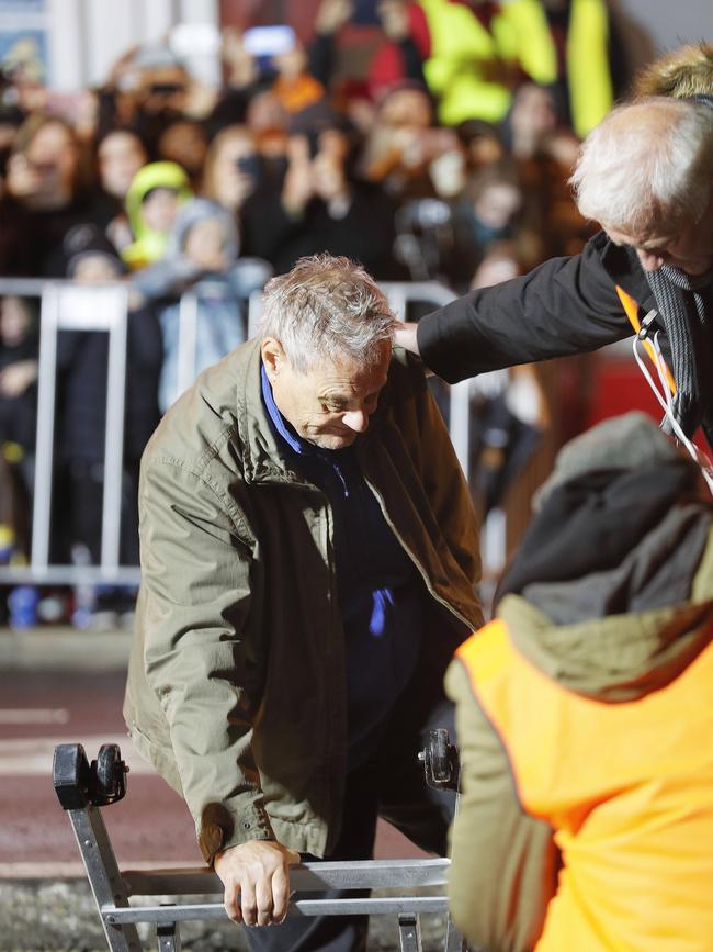 Mike Parr's emergence from beneath Macquarie St after 72 hours underground. Picture: MATHEW FARRELL