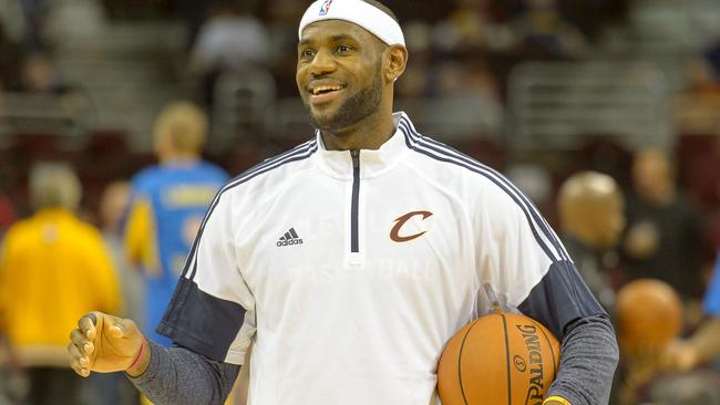 CLEVELAND, OH - OCTOBER 5: LeBron James #23 of the Cleveland Cavaliers warms up prior to the game against Maccabi Tel Aviv at Quicken Loans Arena on October 5, 2014 in Cleveland, Ohio. NOTE TO USER: User expressly acknowledges and agrees that, by downloading and or using this photograph, User is consenting to the terms and conditions of the Getty Images License Agreement. Jason Miller/Getty Images/AFP == FOR NEWSPAPERS, INTERNET, TELCOS & TELEVISION USE ONLY ==