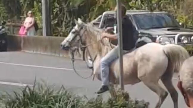 A movie stuntman fined more than $7000 after riding his horse through border blockades has turned up at another protest in northern NSW. Michael Corrigan, 52, was fined after taking part in a rowdy demonstration at Coolangatta-Tweed Heads on August 22.