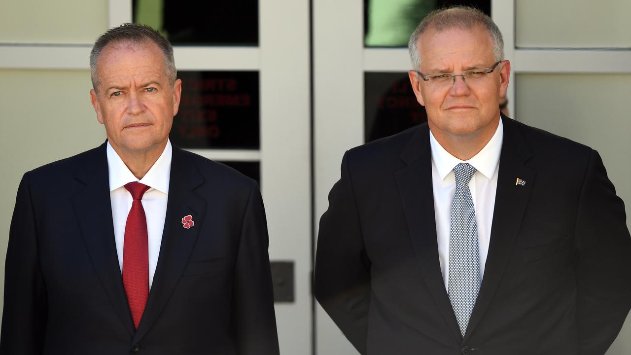 Not willing to pull the trigger yet. Leader of the Opposition Bill Shorten and Prime Minister Scott Morrison. Picture: Mick Tsikas/AAP