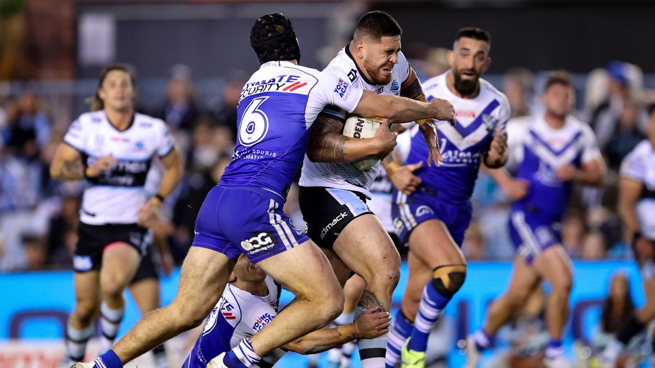 SYDNEY, AUSTRALIA - AUGUST 27: Braden Hamlin-Uele of the Sharks runs the ball during the round 24 NRL match between the Cronulla Sharks and the Canterbury Bulldogs at PointsBet Stadium, on August 27, 2022, in Sydney, Australia. (Photo by Brendon Thorne/Getty Images)