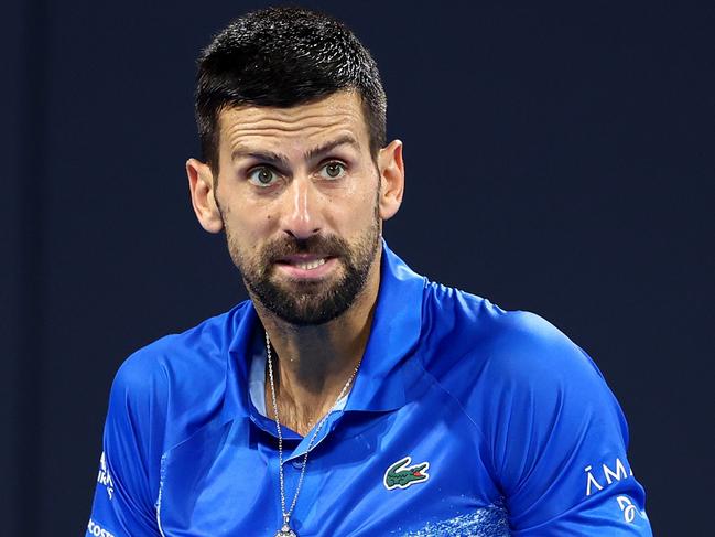 BRISBANE, AUSTRALIA - JANUARY 03: Novak Djokovic of Serbia reacts in his quarter-final match against Reilly Opelka of the USA during day six of the 2025 Brisbane International at Pat Rafter Arena on January 03, 2025 in Brisbane, Australia. (Photo by Chris Hyde/Getty Images)