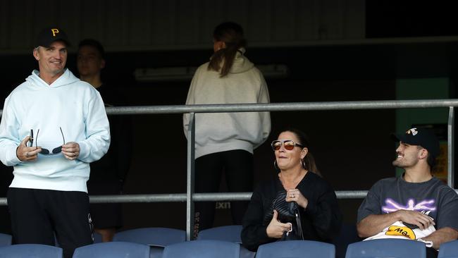 Ivan Cleary, left, and Nathan Cleary, right, watching son and brother Jett Cleary play.