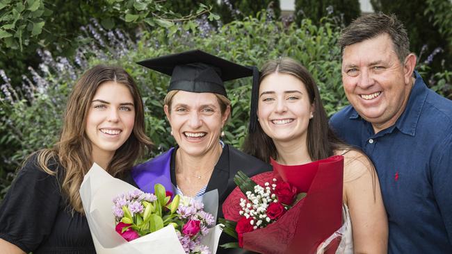 Bachelor of Laws graduate Benita Osborn with daughters Kirra (left) and Teagan and husband Mark Osborn at a UniSQ graduation ceremony at Empire Theatres, Tuesday, February 13, 2024. Picture: Kevin Farmer