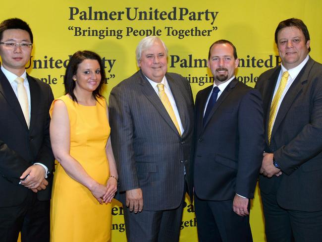 10/10/2013 WIRE: Australian mining billionaire and leader of the Palmer United Party (PUP) Clive Palmer (C) poses with his PUP senators Dio Wang (L), Jacqui Lambie (2nd L) and Glenn Lazarus (R) along with Australian Motoring Enthusiast Party (AMEP) senator Ricky Muir (2nd R) after a press conference where it was announced Muir and Palmer had signed a memorandum of understanding to work together and with intentions for Muir to vote with the Palmer United Party in the Senate, in Sydney on October 10, 2013. Palmer brokered a crucial alliance giving him the balance of power in Australia's new parliament, warning of a 