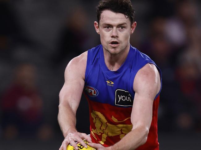 MELBOURNE, AUSTRALIA - AUGUST 12: Lachie Neale of the Lions runs with the ball during the round 22 AFL match between the St Kilda Saints and the Brisbane Lions at Marvel Stadium on August 12, 2022 in Melbourne, Australia. (Photo by Darrian Traynor/Getty Images)