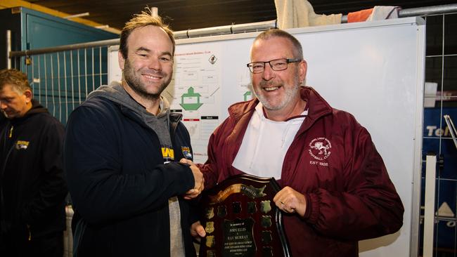 Mitcham coach Paddy Cannane receives the Murray/John Ellis Shield from Colonel Light Gardens vice president Jeff Marshall after the match. Picture: AAP/Morgan Sette