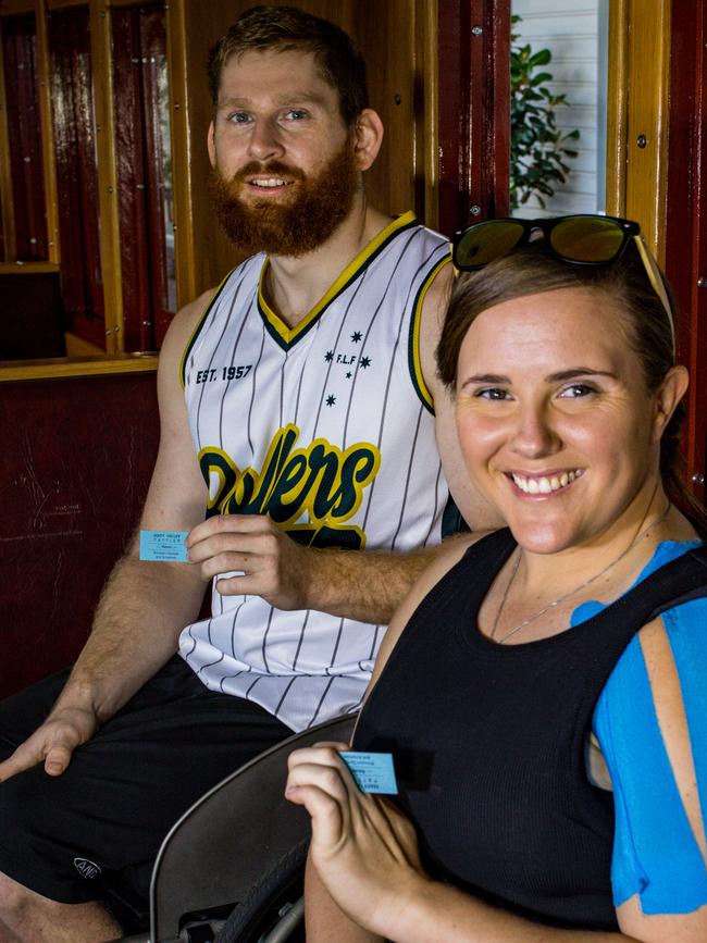 AWARENESS: Steven Elliott and Hannah Dodd help celebrate the opening of the Mary Valley Rattler disability access carriage last month.