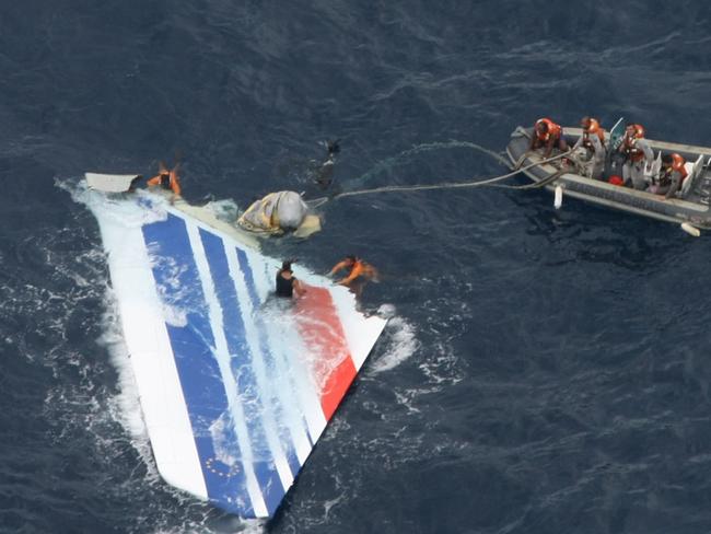 Brazil's Navy sailors recover debris from the missing Air France Flight 447.