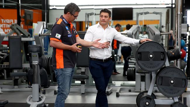 Cronk chats with Giants coach Leon Cameron. Picture: Toby Zerna