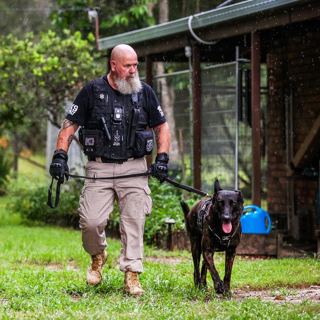 Dan Walker with his Dutch Shepherd Xee who is a security guard for Chelmer, Sherwood and Graceville. Picture: Nigel Hallett