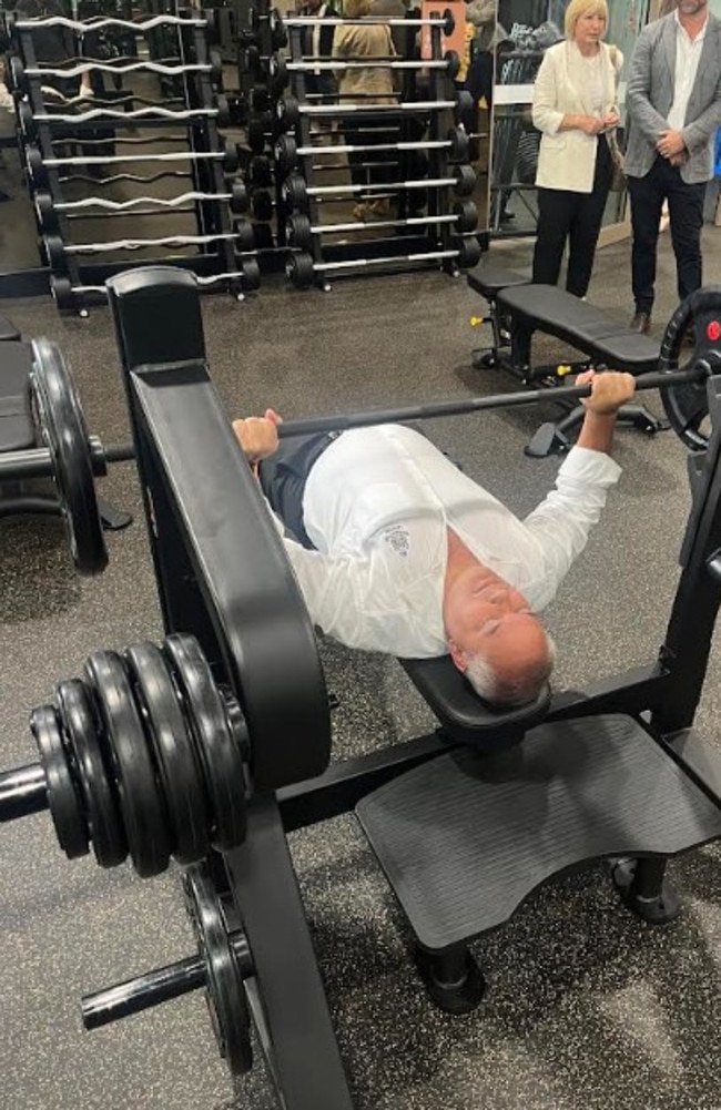 Mayor Tom Tate using the bench press at the new Palm Beach Aquatic Centre.