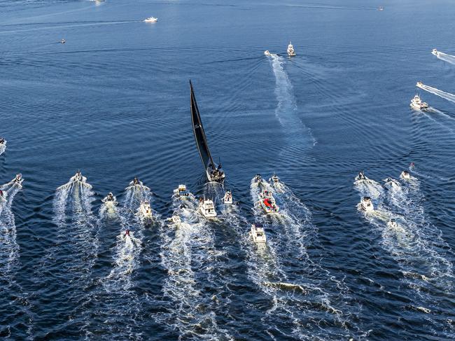 Comanche arriving in Hobart to claim a third line honours victory. Picture: Rolex/Carlo Borlenghi via AAP