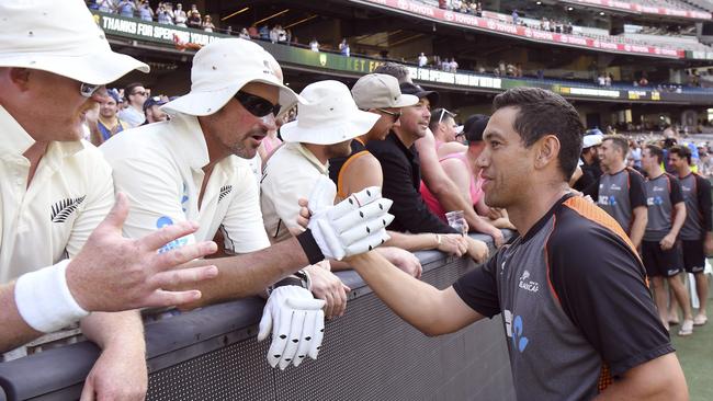 Taylor greets New Zealand fans after their tough four-day loss at the MCG. Picture: AFP