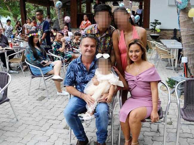 Jason Madden (F-L) held a lavish christening and first birthday party for his daughter at his water park in the Philippines. Picture: Supplied